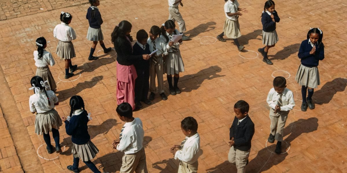 Group storytelling fosters creativity and active listening as children build a narrative together.